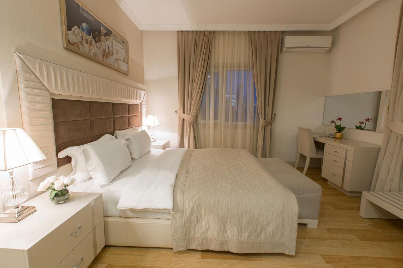 Gabala Garden Hotel Exterior photo A bedroom in a hotel