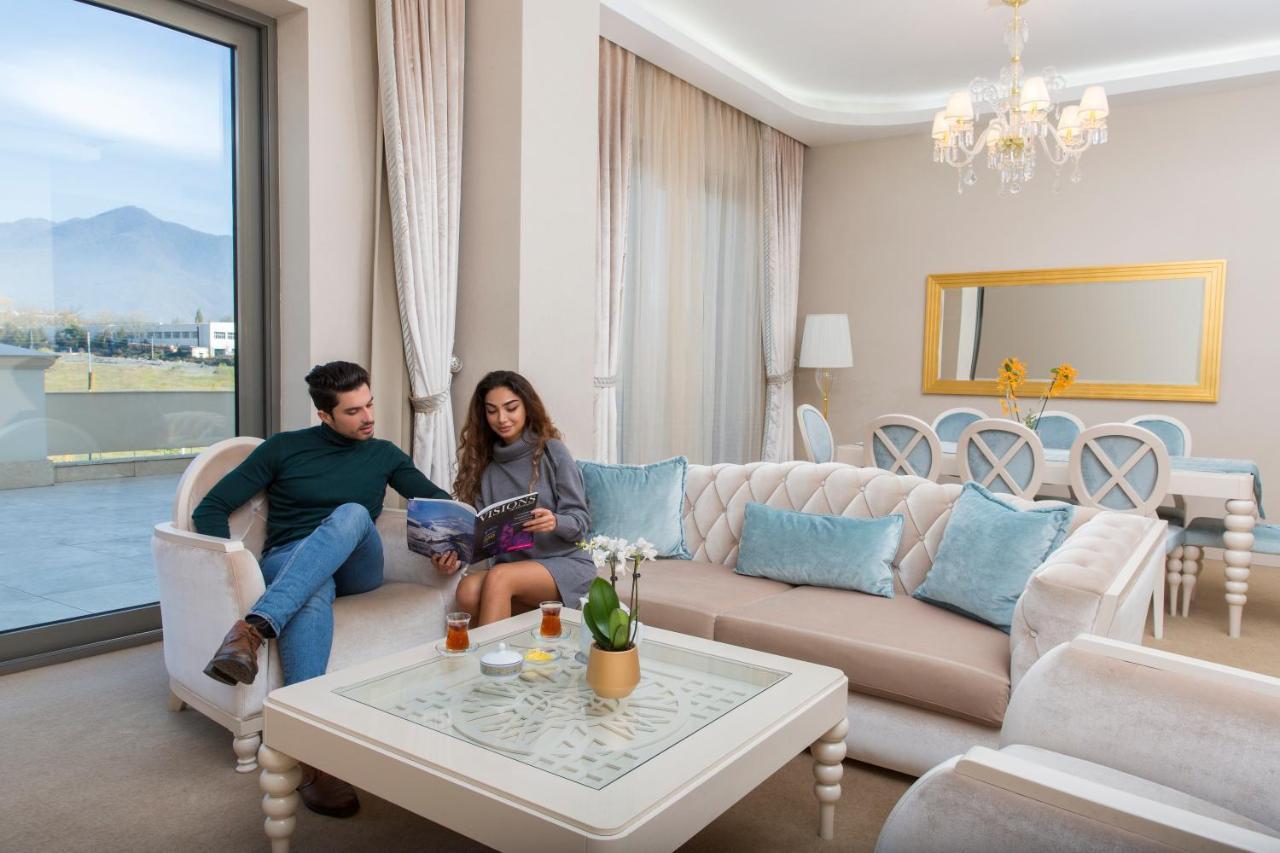Gabala Garden Hotel Exterior photo A living room in a hotel suite